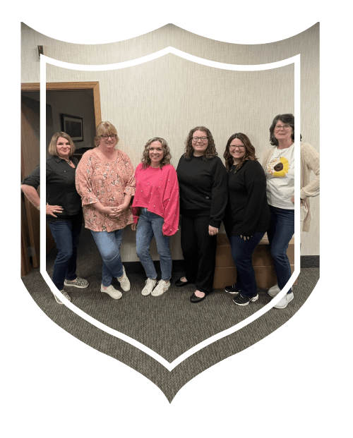 Group of six women employees of Deepwater Industries FCU standing together for picture